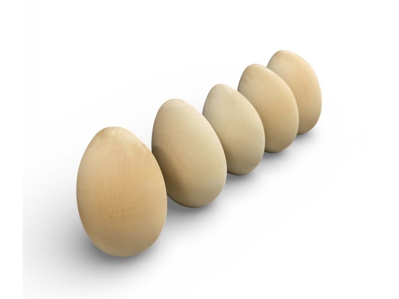 Uovo di legno in tiglio tornito altezze da 8 a 14 cm