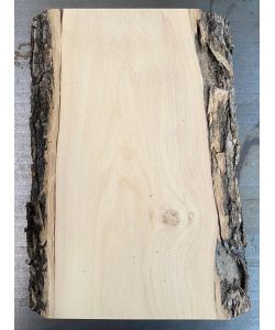 Pieza �nica en madera maciza de olivo con chaflanes y corteza 12x25 cm