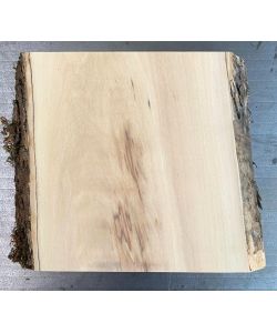 Pieza �nica en madera maciza de olivo con chaflanes y corteza 15x17 cm